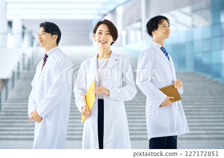 Three men and women wearing white coats Medical image Three men and women wearing white coats Medical image 127172851
