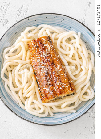 Udon Noodles With Baked Eel And Sweet Unagi Sauce In Bowl 127173401