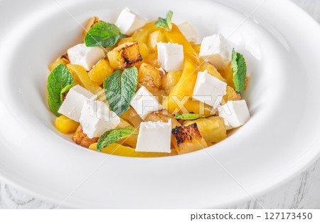 Colorful Salad With Feta, Grilled Peppers, Pineapple And Fresh Mint Leaves 127173450