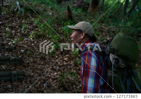 Hiking, mountain climbing, senior camper, dusk, solo camping, senior Hiking, mountain climbing, senior camper, dusk, solo camping, senior 127173865