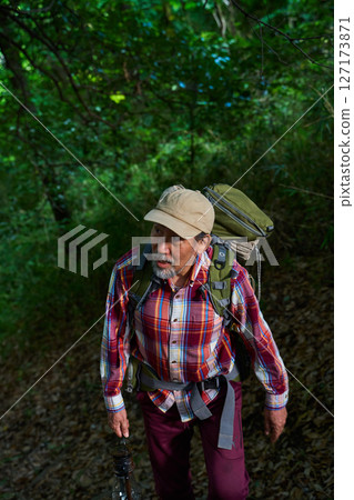 Hiking, mountain climbing, senior camper, dusk, solo camping, senior Hiking, mountain climbing, senior camper, dusk, solo camping, senior 127173871