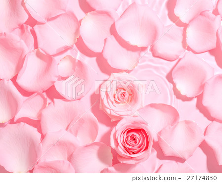 Background material of roses and petals floating on pink water surface (AI generated image) 127174830
