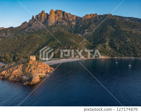 Aerial view town ruins Genoese tower of Porto Corsica France medieval watchtower Mediterranean Sea Calanches de Piana Aerial view town ruins Genoese tower of Porto Corsica France medieval watchtower Mediterranean Sea Calanches de Piana 127174870