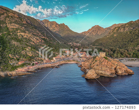 Aerial view town ruins Genoese tower of Porto Corsica France medieval watchtower Mediterranean Sea Calanches de Piana Aerial view town ruins Genoese tower of Porto Corsica France medieval watchtower Mediterranean Sea Calanches de Piana 127174893
