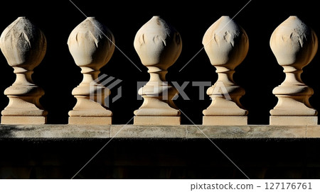 Elegant Stone Balustrade Architectural Detail Sunlight old row art form beige cream brown decor 127176761