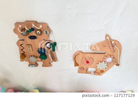 Busy board for developing fine motor skills in toddlers Busy board for developing fine motor skills in toddlers 127177129