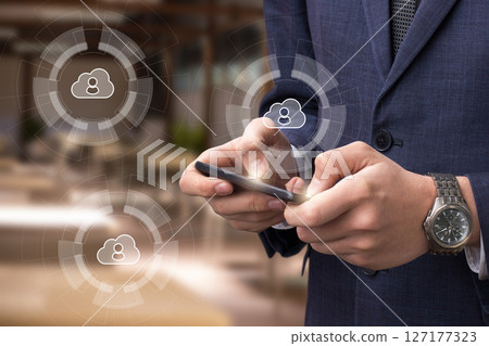 Pro using smartphone in modern office Pro using smartphone in modern office 127177323