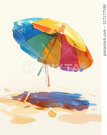 A bright umbrella stands alone on a sandy beach, casting a shadow on the ground. The colors of the umbrella are vivid, adding charm to the sunny seaside environment. 127177586