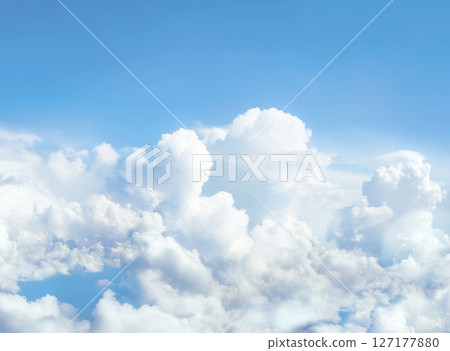 Sky and clouds above from airplane window Sky and clouds above from airplane window 127177880