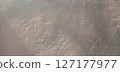 high-resolution background image featuring an earthy beige stone surface with rugged textures, ideal for design, overlays, creative projects, and presentations 127177977
