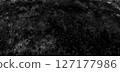 high-resolution background image featuring a rugged black stone texture with distressed details, ideal for design, overlays, creative projects, and presentations 127177986
