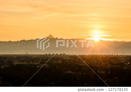 Incredible sunset over Turin city with snowy Alps mountains Incredible sunset over Turin city with snowy Alps mountains 127178135