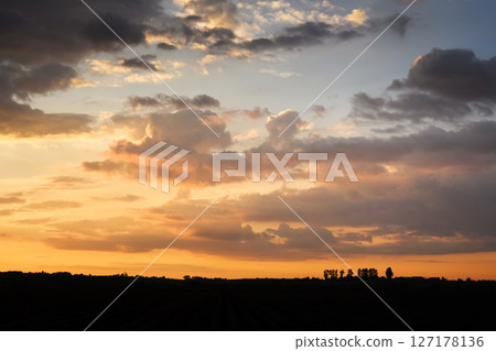 Incredible sunset with dramatic clouds 127178136