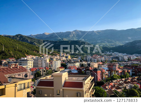 Panoramic view of the city of Budva, Montenegro, on a sunny summer day.  127178833