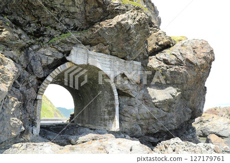 An old tunnel remaining on the old Golden Road (Hokkaido, Japan) An old tunnel remaining on the old Golden Road (Hokkaido, Japan) 127179761
