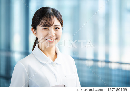 A female nurse. A female nurse. 127180169