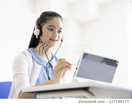 Girl learning tablet 127180177