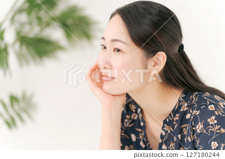 A young woman with a smile A young woman with a smile 127180244