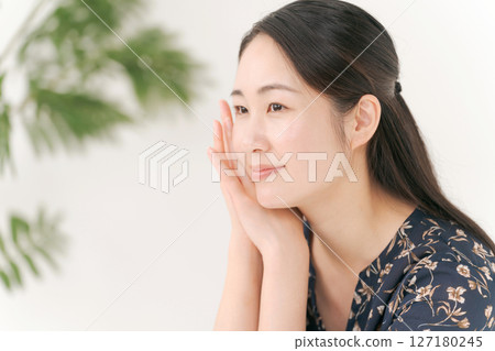 A young woman with a smile A young woman with a smile 127180245