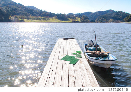 Pier and boat Pier and boat 127180346