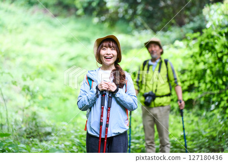 Hiking, trekking, senior, walking, mountain climbing 127180436