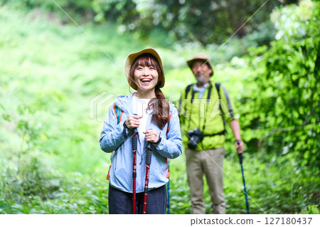Hiking, trekking, senior, walking, mountain climbing 127180437