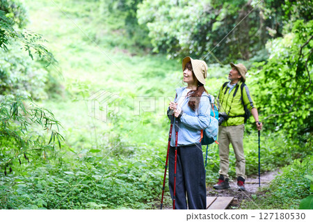 Hiking, trekking, senior, walking, mountain climbing Hiking, trekking, senior, walking, mountain climbing 127180530