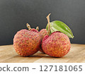 Fresh lychee fruit in the wooden 127181065
