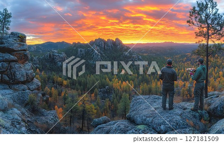 Majestic Sunrise Over Black Hills National Forest with Two Figur 127181509