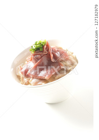 Two-tone bowl of red tuna and medium fatty tuna photographed on a white background 127182979