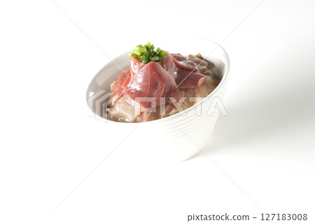 Two-tone bowl of red tuna and medium fatty tuna photographed on a white background 127183008