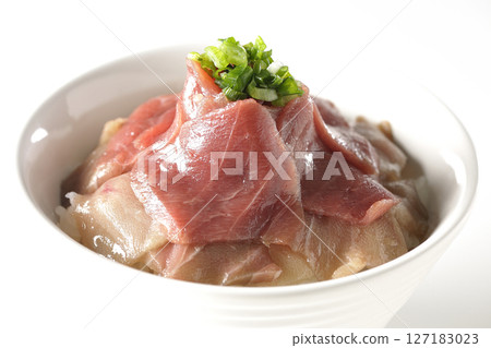 Two-tone bowl of red tuna and medium fatty tuna photographed on a white background 127183023