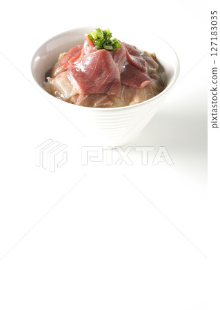 Two-tone bowl of red tuna and medium fatty tuna photographed on a white background 127183035