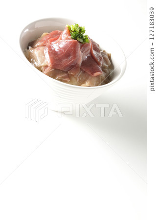 Two-tone bowl of red tuna and medium fatty tuna photographed on a white background 127183039