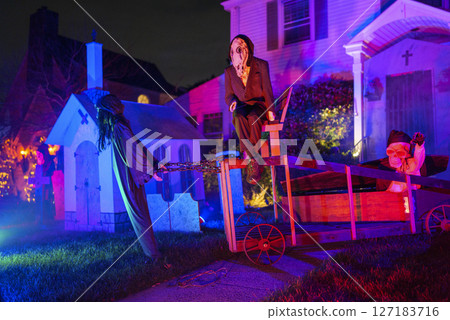 Spooky Halloween Yard Display with Skeletons, Pumpkins, and Haunted Figures Spooky Halloween Yard Display with Skeletons, Pumpkins, and Haunted Figures 127183716
