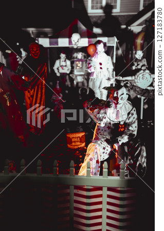 Creepy Halloween Clown Scene with Kissing Booth and Carnival Setup 127183780