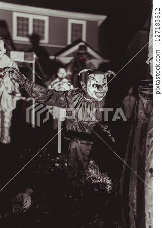 Creepy Halloween Clown Scene with Kissing Booth and Carnival Setup 127183812