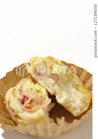 Homemade bacon cheese bread photographed on white background Homemade bacon cheese bread photographed on white background 127184058