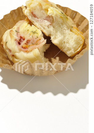 Homemade bacon cheese bread photographed on white background Homemade bacon cheese bread photographed on white background 127184059