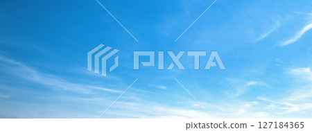 clear blue sky with clouds 127184365