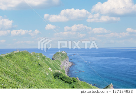 Shakotan Town, Hokkaido: Cape Kamui and Cape Kamui Lighthouse in summer with beautiful fresh greenery 127184928
