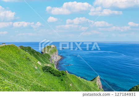 Shakotan Town, Hokkaido: Cape Kamui and Cape Kamui Lighthouse in summer with beautiful fresh greenery Shakotan Town, Hokkaido: Cape Kamui and Cape Kamui Lighthouse in summer with beautiful fresh greenery 127184931