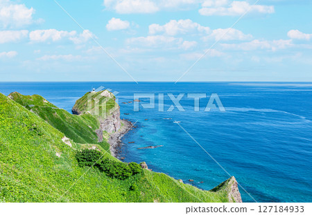 Shakotan Town, Hokkaido: Cape Kamui and Cape Kamui Lighthouse in summer with beautiful fresh greenery 127184933