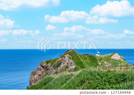Shakotan Town, Hokkaido: Cape Kamui and Cape Kamui Lighthouse in summer with beautiful fresh greenery 127184946