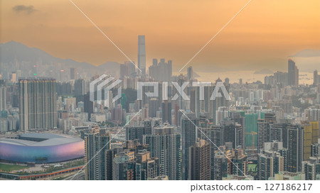 June 6 2025 Skyline at Sunset with Vibrant Urban Buildings and Harbor View 127186217