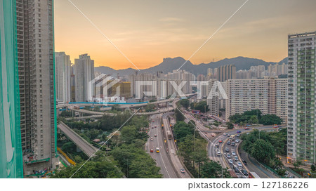 June 6 2025 Urban Cityscape at Sunset with Skyscrapers and Mountainous June 6 2025 Urban Cityscape at Sunset with Skyscrapers and Mountainous 127186226