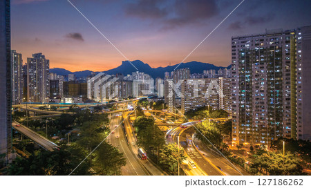 June 6 2025 Night Cityscape Featuring Illuminated Streets and Towering Skyscrapers 127186262