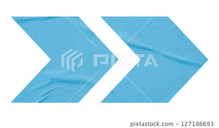 Light blue crumpled paper arrow isolated on transparent background 127186693