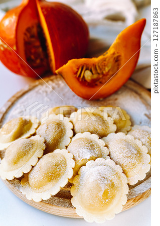 Ravioli with pumpkin filling 127187863
