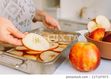 Preparing apples for drying Preparing apples for drying 127187973